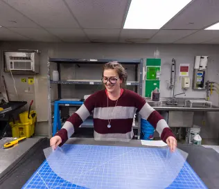 Person working with materials